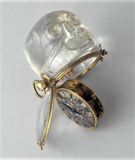 drdan_o's tweet photo. The striking case of this watch is a rock crystal skull with a large grin. Movement inscribed for Jacques Joly. c.1650 (@MuseeLouvre) #mementomori #skull #WyrdWednesday https://t.co/PzDZgEdSll