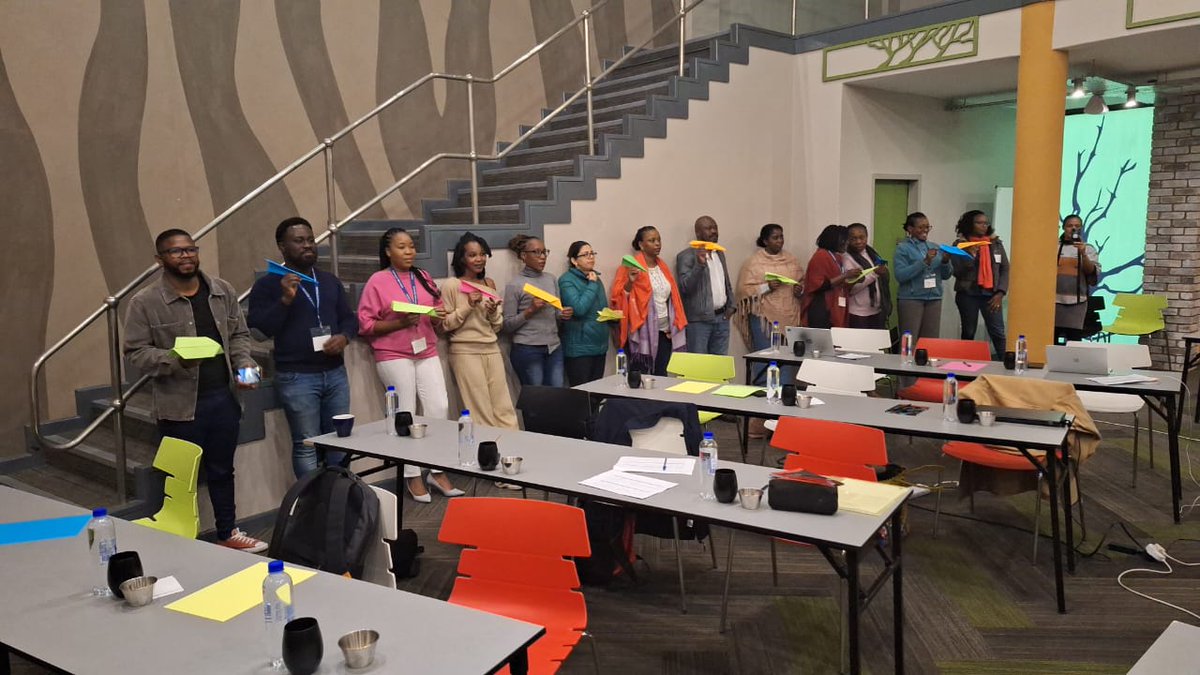 ze2mkhwa's tweet photo. Today's recap session was a blast! We took a detour from the usual dullness and soared into a realm of paper aircraft extravaganza because, hey, we don't do boring @FSNetAfrica 
#FSNetAfricaWriteShop https://t.co/EFI6CjcWhq