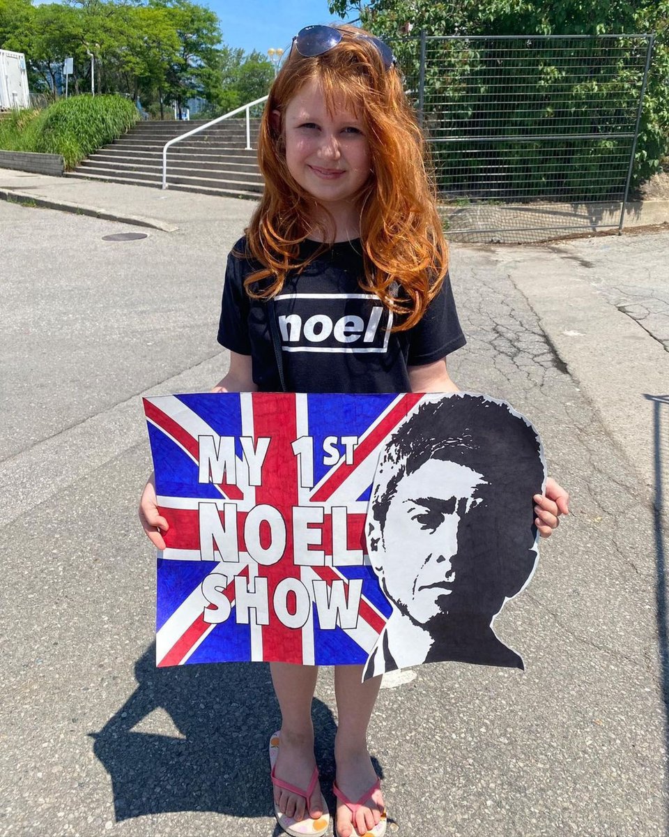 "Yesterday my Oasis fandom came full circle. I took my 9 year old daughter Jill to her first gig (along with my fantastic friend Ming!), and we made a sign for the show, as well as a gift bag full of Canadian snacks and goodies (hats, chocolate, ketchup chips, Jos Louis, of