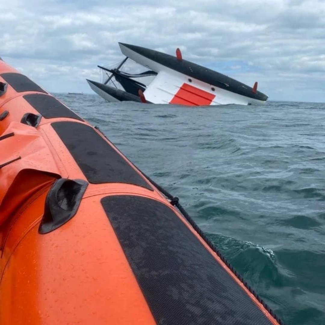 RNLI's tweet photo. When a 20 metre multi-hull boat capsized during the Isle of Wight boat race, @RNLI_Portsmouth volunteers raced to the rescue.

Three people had to be transferred to @BembridgeRNLI after feeling the effects of cold water immersion.

Well done everyone.  👏 

#RNLI https://t.co/VPJUPxcTui