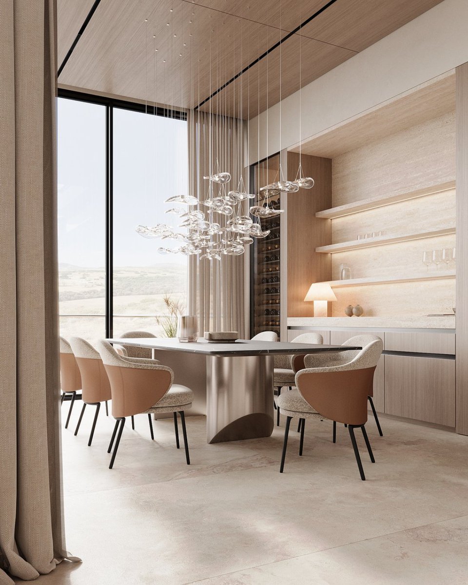 SenceArchitects's tweet photo. The dining room is adorned with exquisite veneered wood fronts and natural travertine stone. The dark marble table creates a striking contrast against the sandy color palette that encompasses the entire dining area. #interiordesign #architecture https://t.co/pt3QqLTFcW https://t.co/oos9aypq41