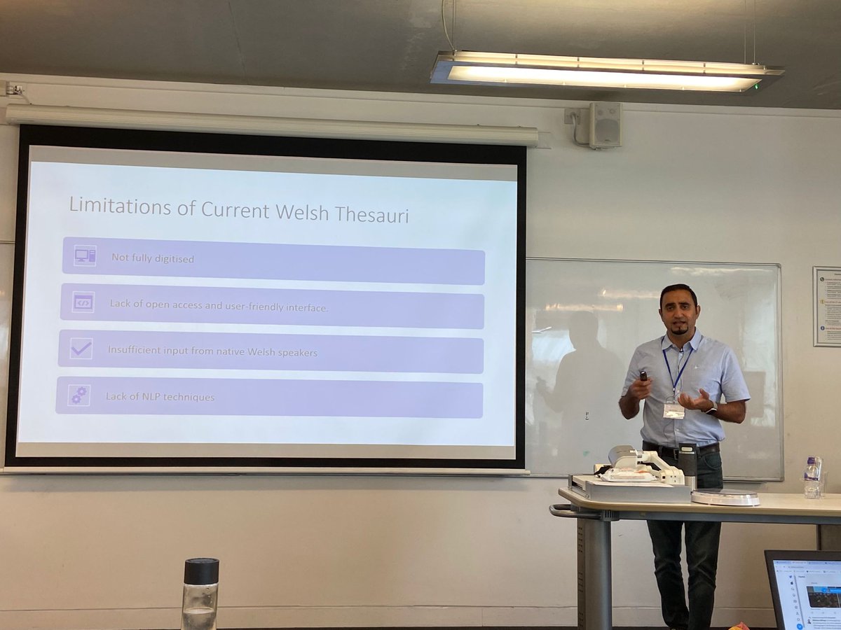 Watching <a href="/DocElhaj/">Dr Mo El-Haj</a> presenting about the Thesawrws project to create an open access thesaurus for the Welsh language using #NLProc #CL2023