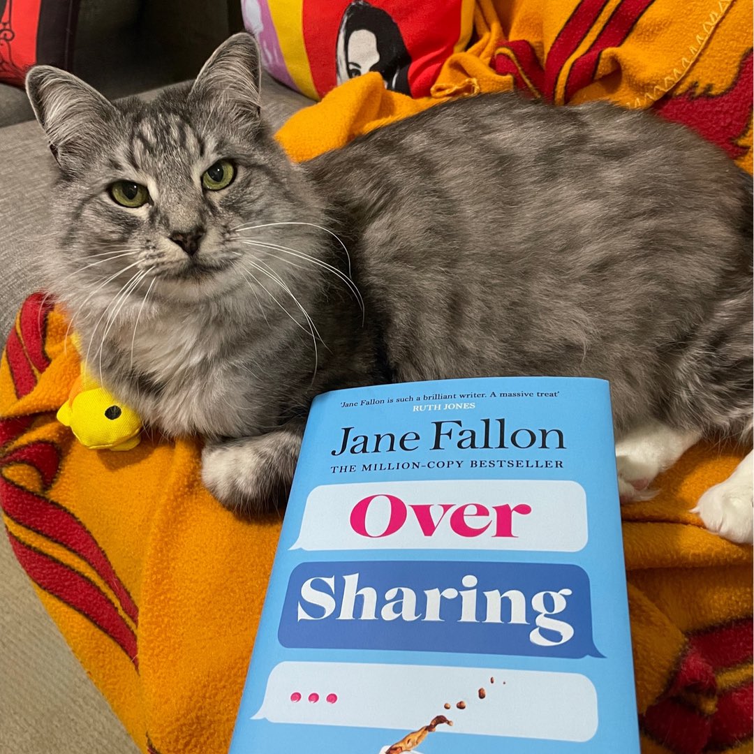 ClaireComedy's tweet photo. Yippee!! My signed copy of lovely @JaneFallon’s latest smash hit #OverSharing made it to Sydney, thanks to the fab people at @WELBooks. Piper is doing his best to join the #PromoPet parade. 😀📚😻 https://t.co/NtE060vcen