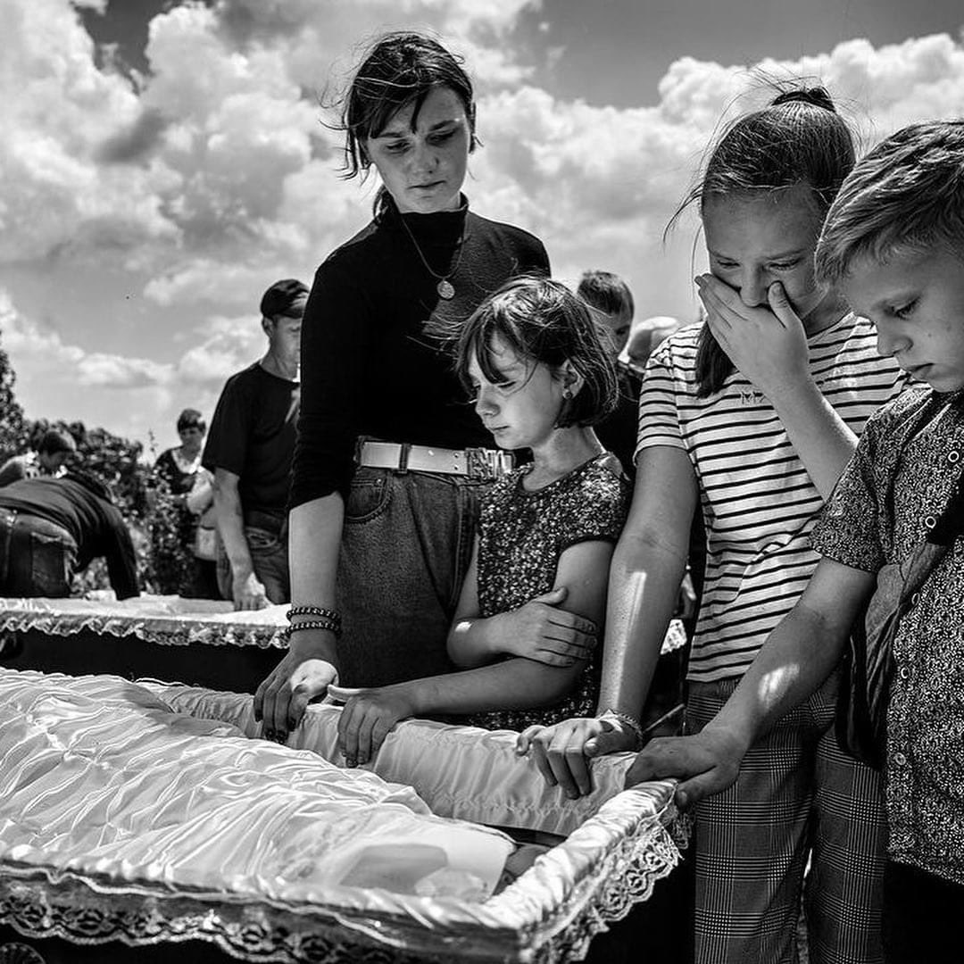A mother is burying her 14-year-old twin daughters, Anna and Yuliia, who were killed in a recent Russia’s terrorist attack on Kramatorsk. 

Girls were visiting their mother, a surgeon at the Kramatorsk hospital. Before returning to their village of Dobropillia, they decided to