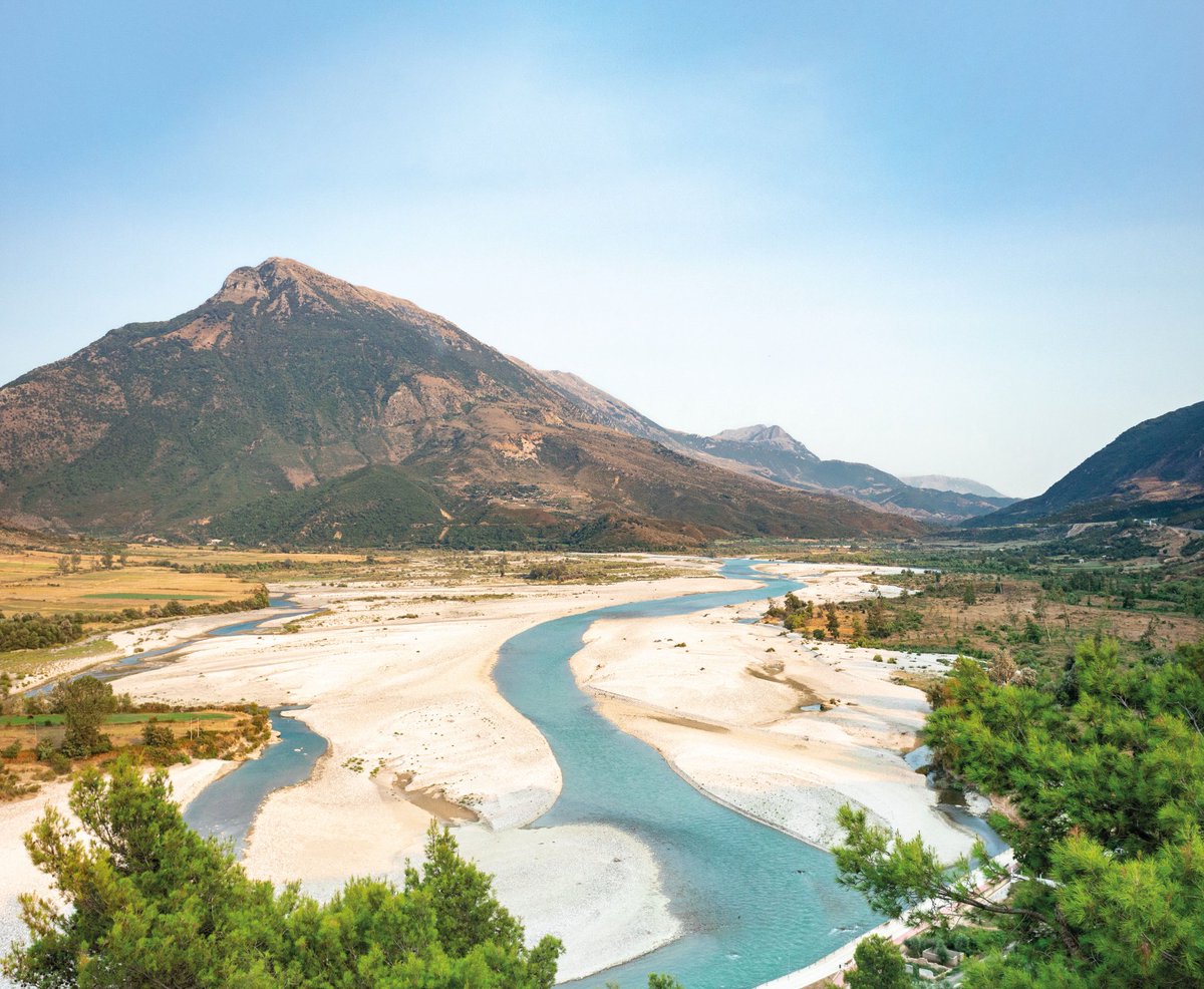 TGOMagazine's tweet photo. 🥾@explore_ellis walks the Vjosa, Europe's first Wild River National Park.
"Day one wasn’t over. An enchanting melody drifted down from the mountains. Will rolled over. We have to find out what that music is."
📸@skylerkim34
Read on in #TheGreatOutdoors.
👉https://t.co/D1HRWkJCt5 https://t.co/amQxpMHLQm