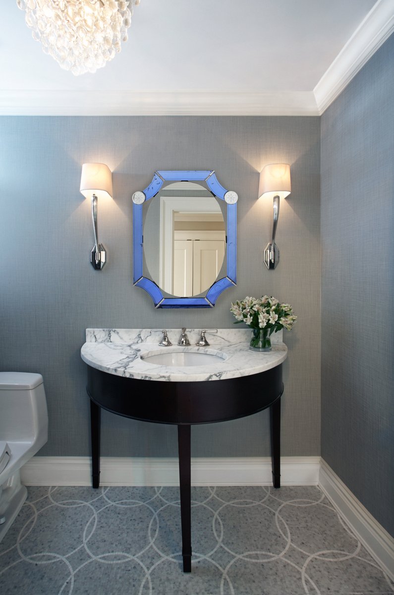 What could be better than a blue glass mirror in this classic powder room? 

#powderroom #EvelynBenatar #EvelynBenatarDesign #NYInteriorDesign #NewYorkInteriorDesign