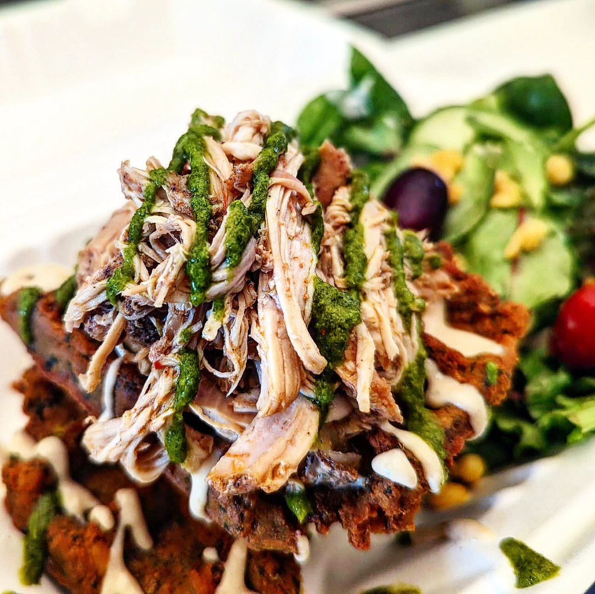 Their dishes are beyond unique ranging from the curried chickpea falafel waffle to their mac and cheese topped with lamb merguez crumble! Customers can experience and enjoy many global flavors with their menu items!