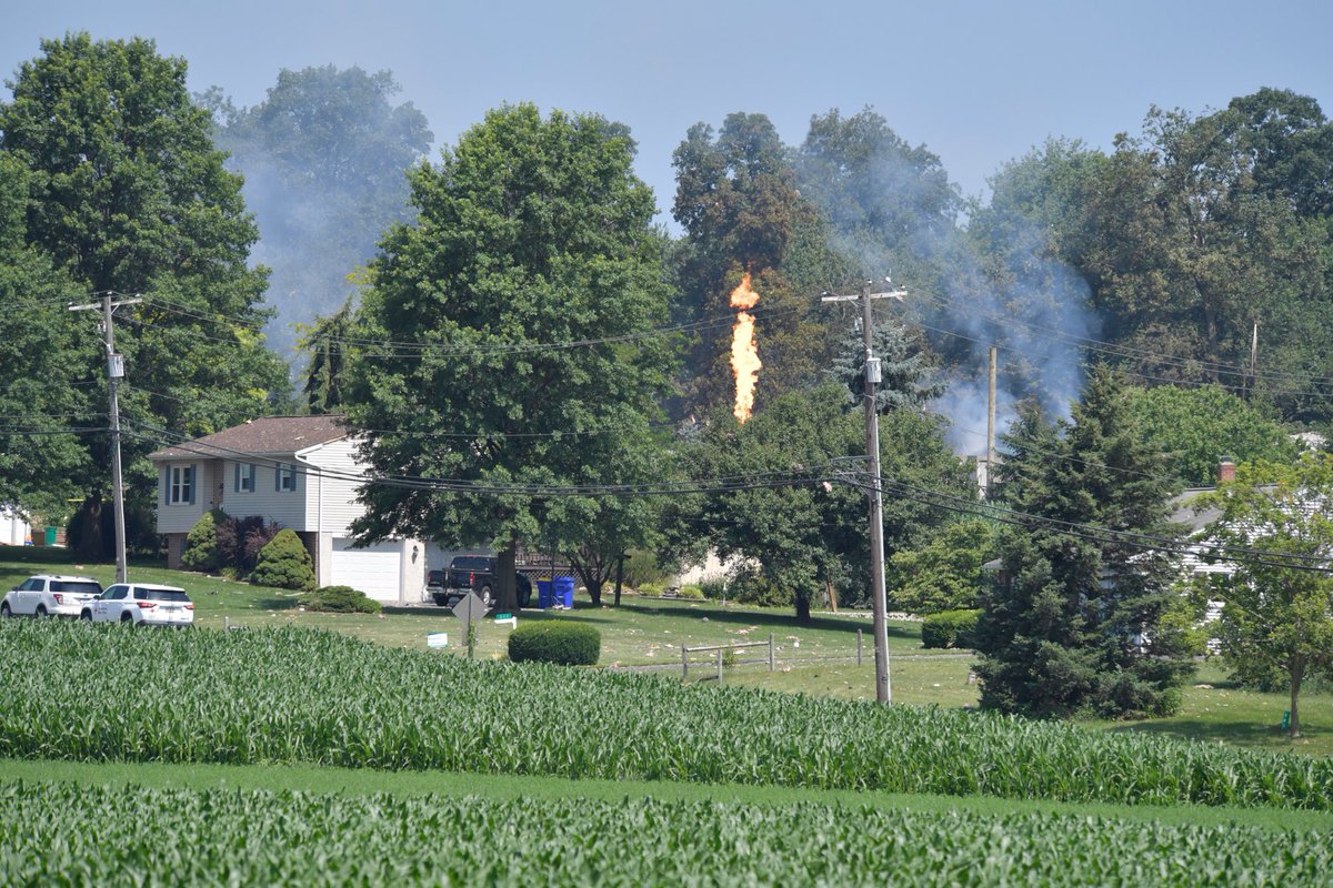A controlled burn of the gas tanks on site at the Rapho Twp. building is taking place right now. A single flame shoots into the air as the propane is released and burned. ⁦<a href="/LancasterOnline/">LNP | LancasterOnline</a>⁩ ⁦<a href="/JackPanyard/">Jack Panyard</a>⁩ ⁦<a href="/annrejrat/">Ann Rejrat</a>⁩