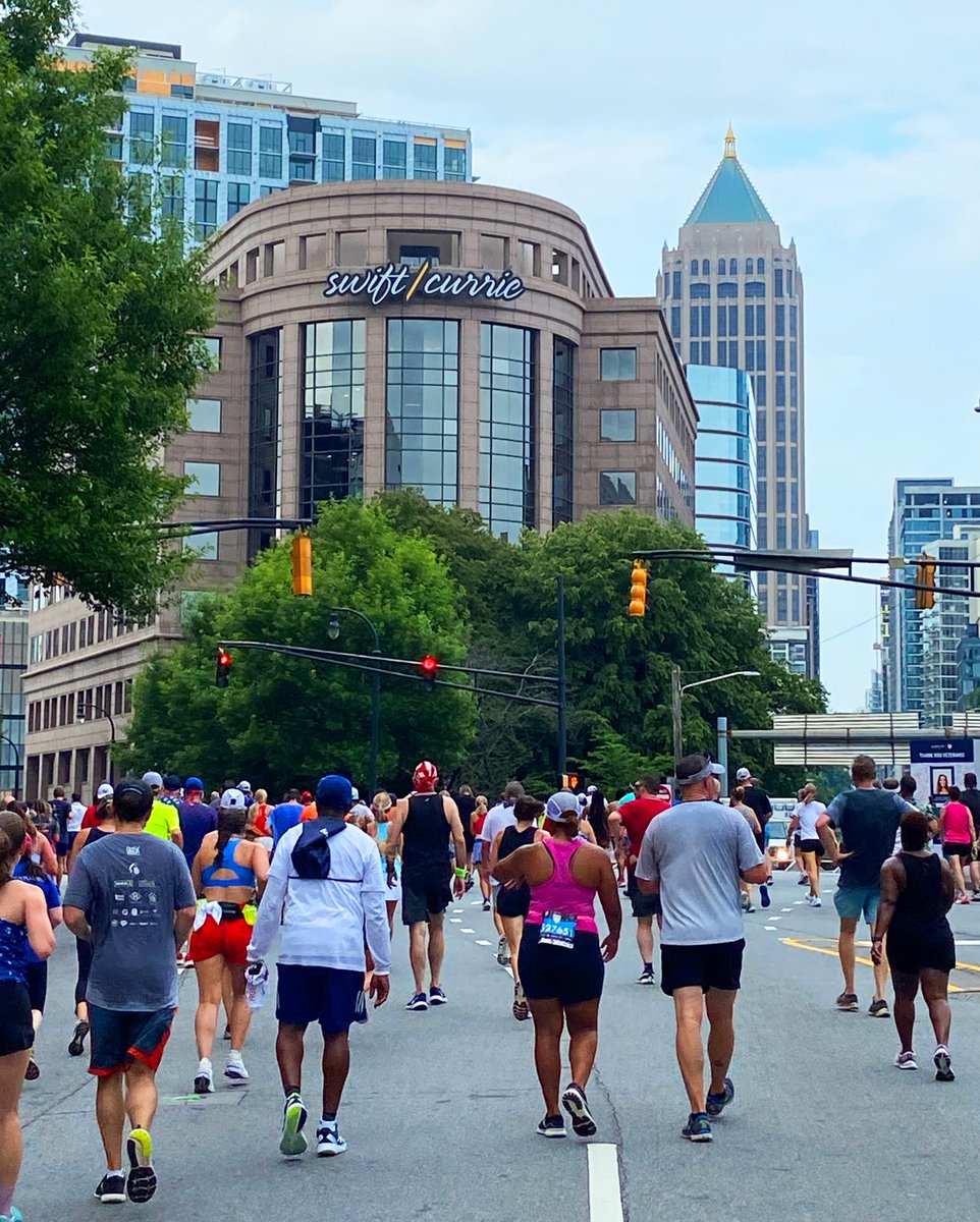 SwiftCurrie's tweet photo. Congratulations to everyone who participated in the 54th annual Peachtree Road Race yesterday. Our Atlanta office had the best view of the action! ππ #SwiftCurrie #PeachtreeRoadRace https://t.co/ba6LbA5rCk