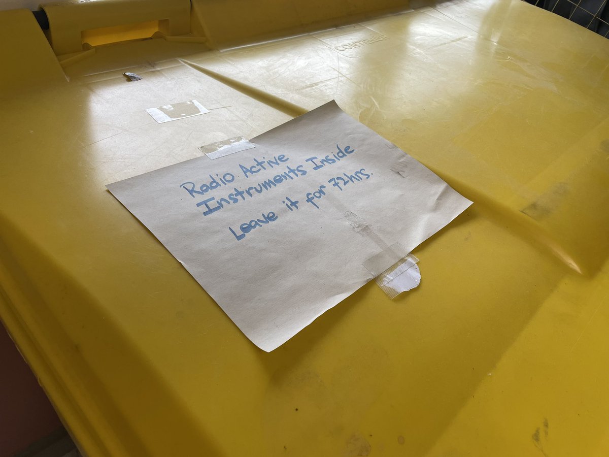 Cool, yeah, this plastic bin and piece of paper seem radioactively secure.