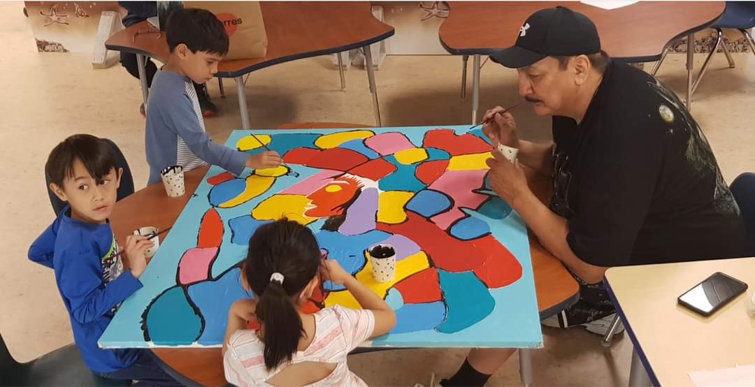 NorvalMofficial's tweet photo. LOOK: Norval Morrisseau Estate Ltd. previously donated an unfinished Norval Morrisseau painting to #EcoleNorvalMorrisseau - @ES_NOMO. In a heartwarming event, Eugene Morrisseau, the late artist's son, recently visited the school &amp; completed the artwork together with the kids! https://t.co/EtUMVEVJlx