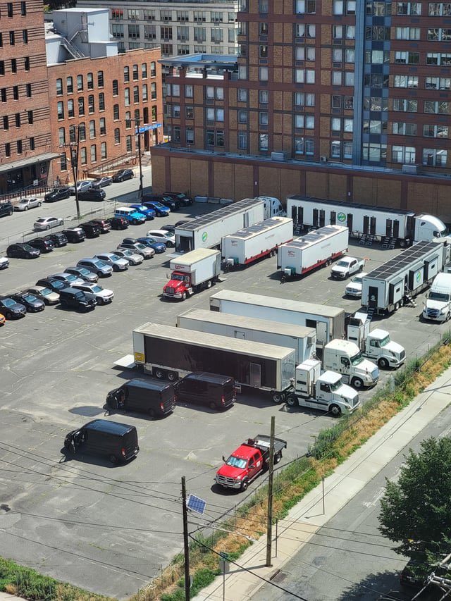 that_sarah's tweet photo. @WGAEast staging area for a major picture/tv production across from me in jersey city. Corner of Warren and Steuben. https://t.co/EqK8SOEhuD