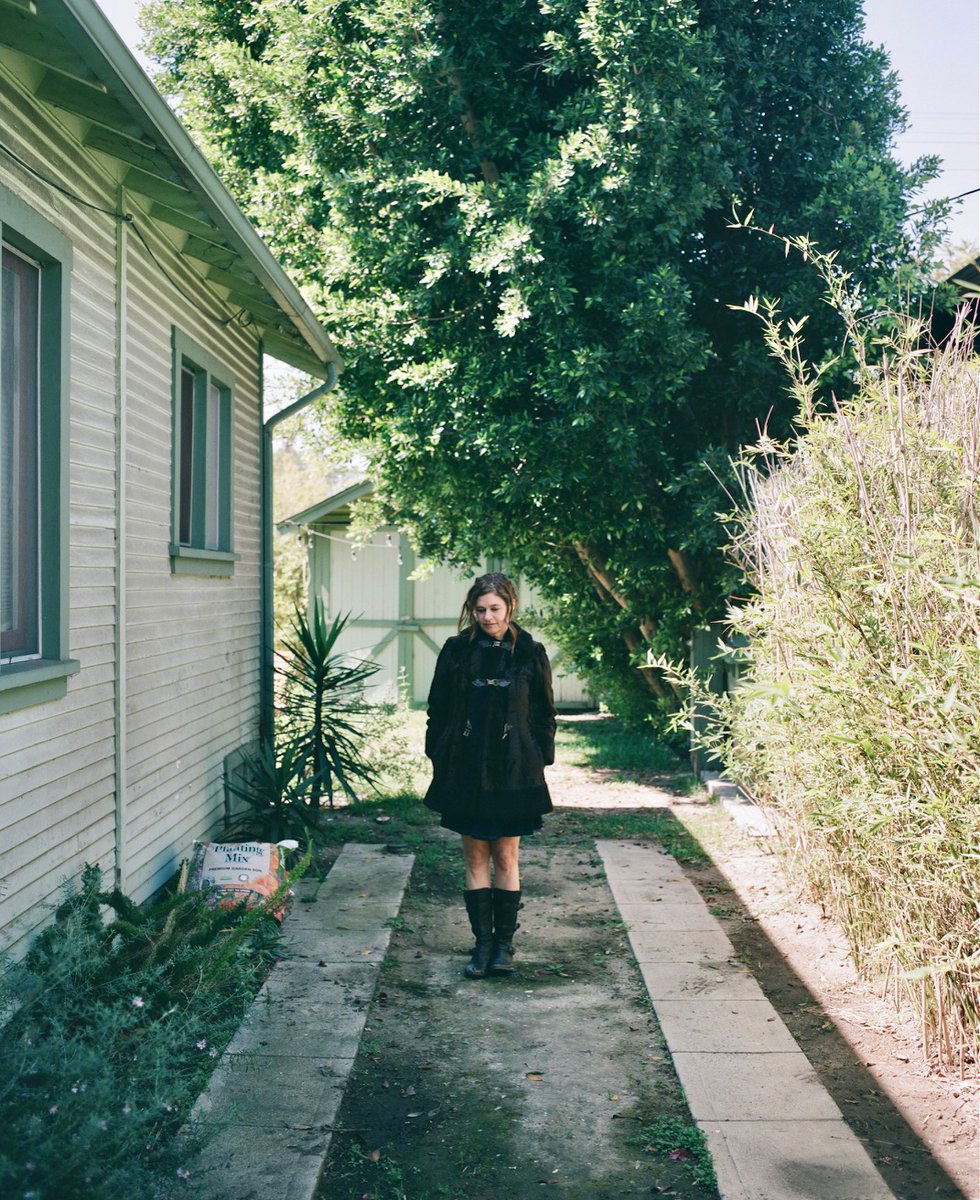 Songwriting is healing. Maybe the perfect world created with a song can appear too ideal to translate to living, but it's a road map. Even a pin-drop of the place where sanity lives is a direction to aim for.

Photo by Emilia Paré
H/MU by Sydney Costley