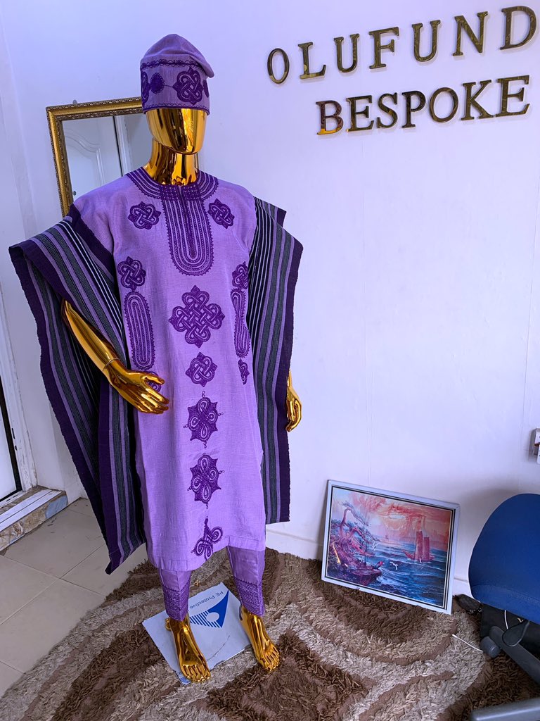 Groom: I want plain lilac and patterned purple aso oke creatively combined  together to craft an agbada for my trad wedding. The masterpiece crafted: