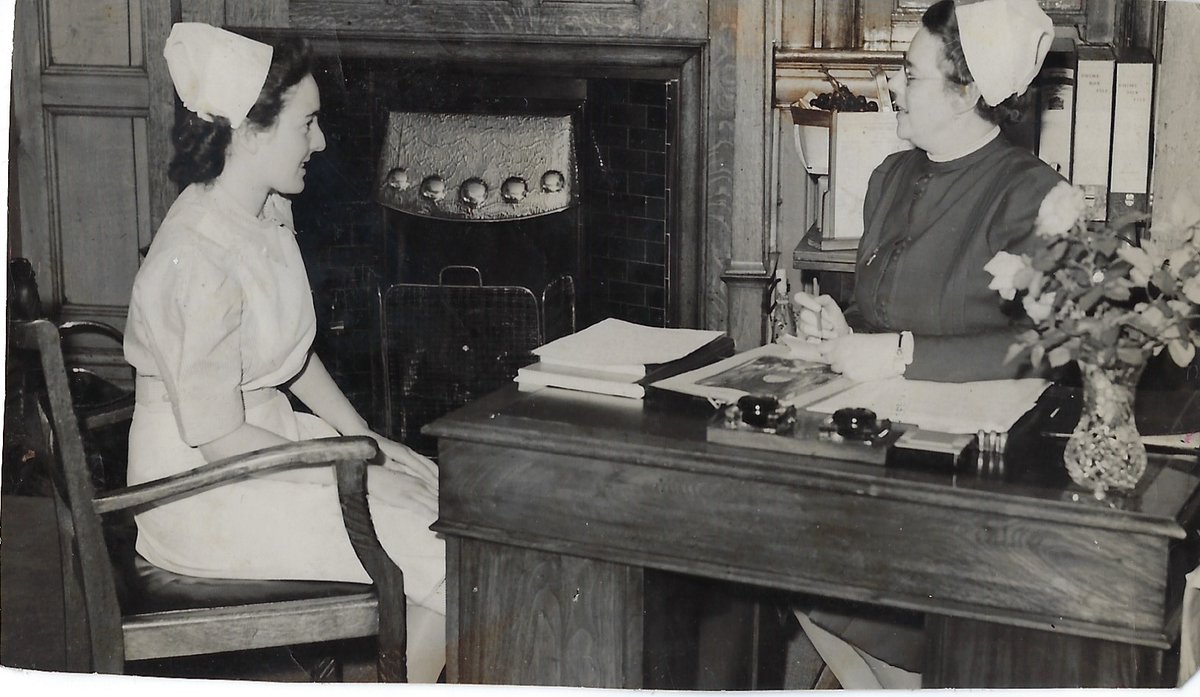 LornaJo23147054's tweet image. Two of our residents had careers in nursing. The black and white photo shows our Mary talking to the Matron of Doddington Hospital. In the colour photo is our Hilda in her Theatre Nurse Scrubs. #NHS75 @blackswancare @CareNetworkCamb