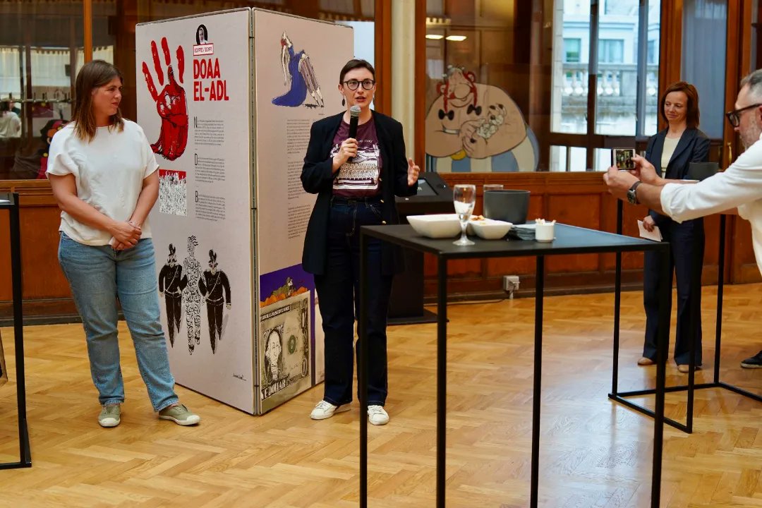 DrawFor_Change's tweet photo. ✍✊We are thrilled to share the first pictures of the #DrawForChange exhibition, opened last night! 

Artists Doaa El-Adl &amp; Victoria Lomasko, who star two of the DRAW FOR CHANGE Documentary Series episodes, were present at the opening in Belgian Comic Strip Center. https://t.co/yQs0jFsrDQ