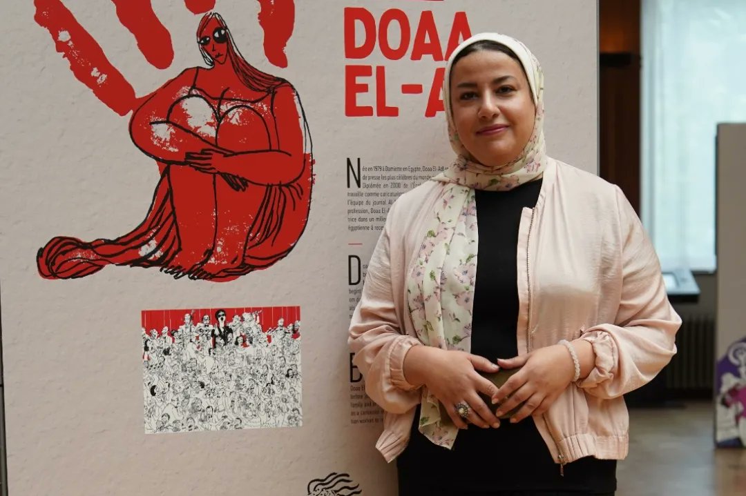 DrawFor_Change's tweet photo. ✍✊We are thrilled to share the first pictures of the #DrawForChange exhibition, opened last night! 

Artists Doaa El-Adl &amp; Victoria Lomasko, who star two of the DRAW FOR CHANGE Documentary Series episodes, were present at the opening in Belgian Comic Strip Center. https://t.co/yQs0jFsrDQ