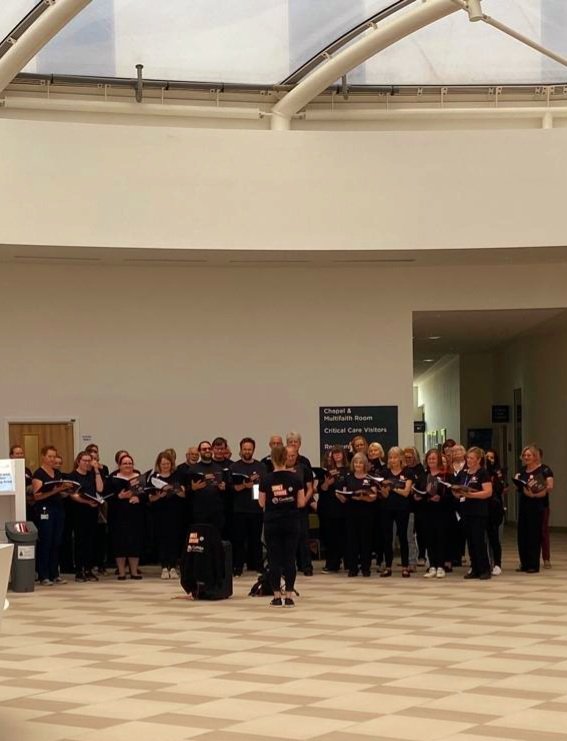 PapworthPhysio's tweet photo. Happy Birthday #NHS75 celebrating today with lunch provided by @RRT_UK and OCS as we also welcome new colleagues Aneesha and Emily. @RoyalPapworth and @CUH_NHS 🤝 for #NHSBirthday, musically supported by our Campus choir @singchoirs 🎶 💙 https://t.co/x7Abv8Mjby