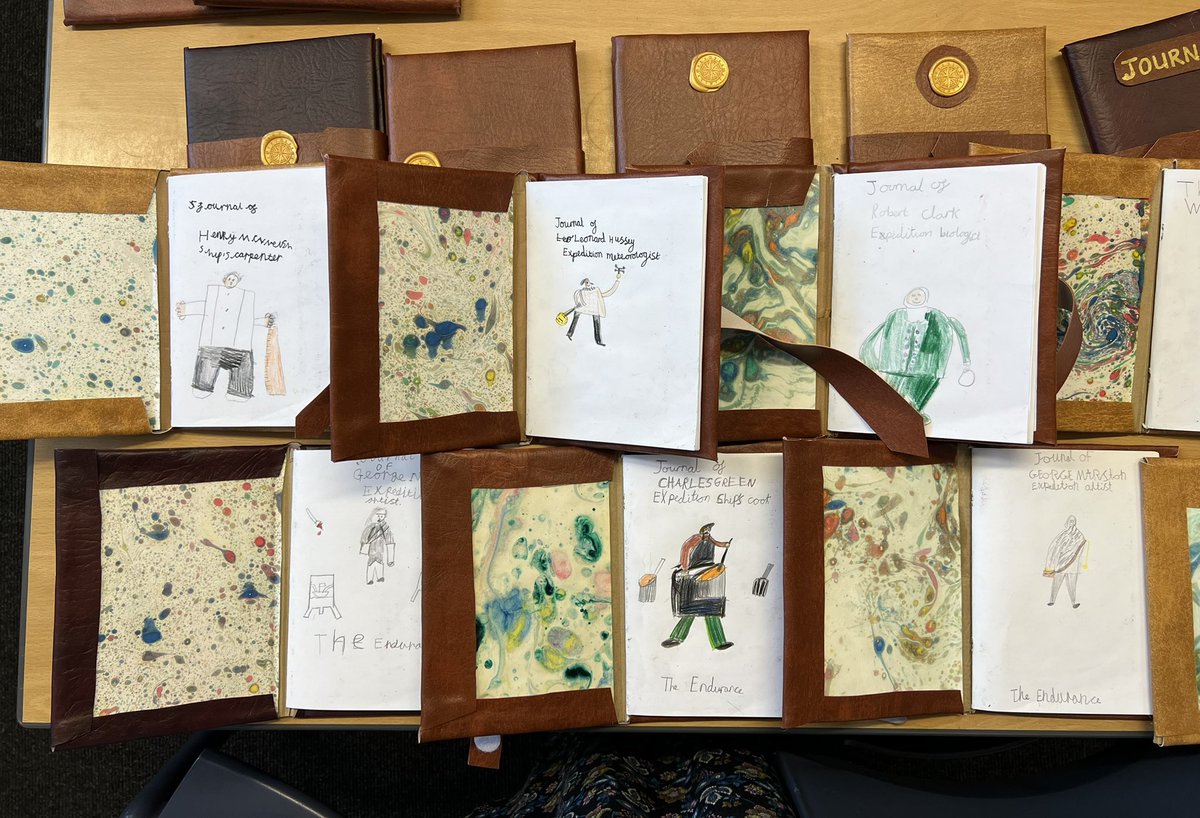 school_georges's tweet photo. Year 4 have made a library of books as part of a Briiish Library project @BL_Learning Each child was given a crew member from Shackleton’s Endurance and they’ve written in role. They made endpapers by marbling and created a compass seal to decorate. https://t.co/AVmlIZzWlN