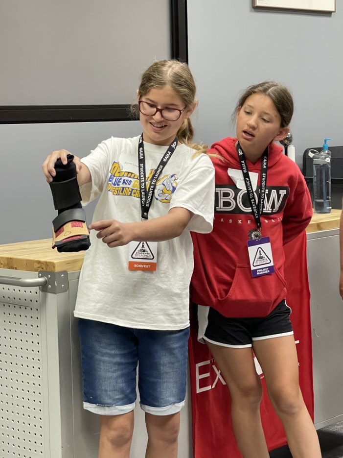 students2launch's tweet photo. #StudentsToLaunch is glad to have partners like @AIAA that help us host Hub events like at @Explorithandson last week in Aurora, NE. Check out the fun that the students had developing Astro Socks, exploring the #GiantMoonMap & designing #PoscardstoSpace. https://t.co/T718bwFkFW https://t.co/WELDGuG1x1