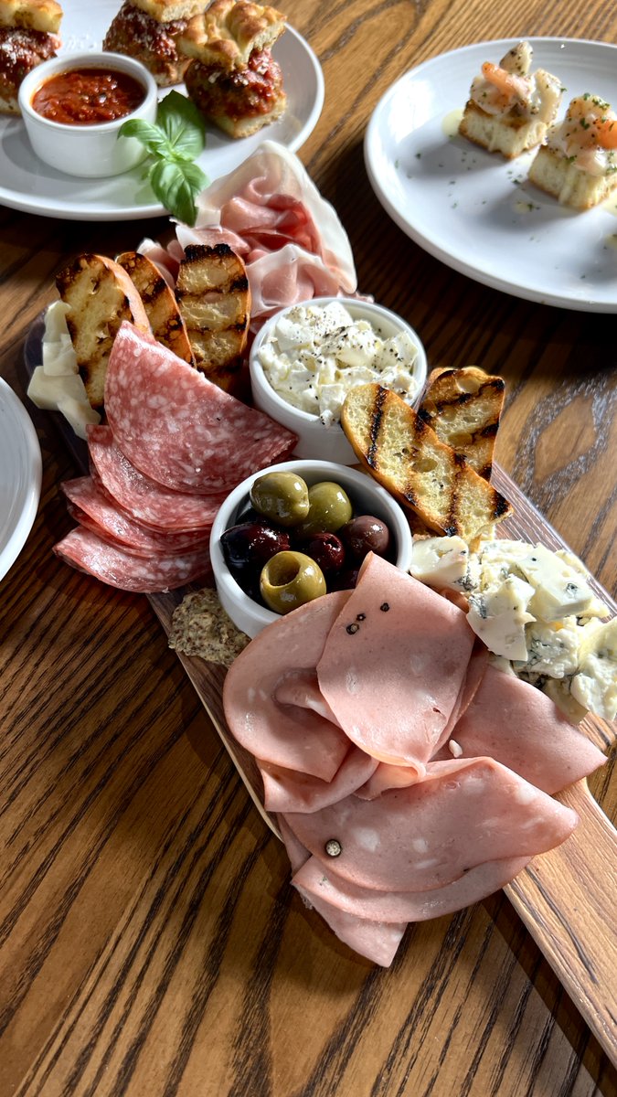 Catch up over charcuterie 🧀🥖🍇🫒 ONLY at The C Bar Happy Hour at Carrabba’s from 4-7 PM. #Charcuterie #Wine #HappyHour