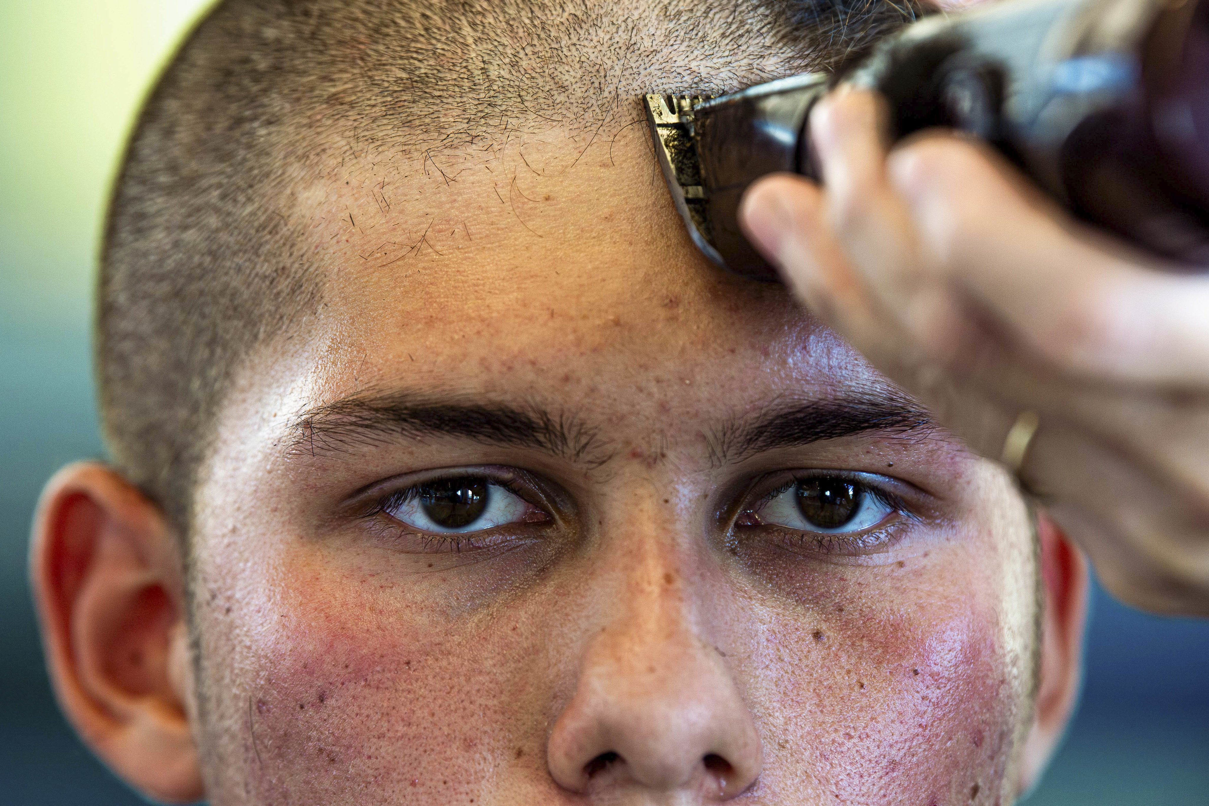 Department of Defense on X You always remember that first haircut of your military career An usairforce basic cadet gets a haircut during in processing at the U.S. Air Force Academy in