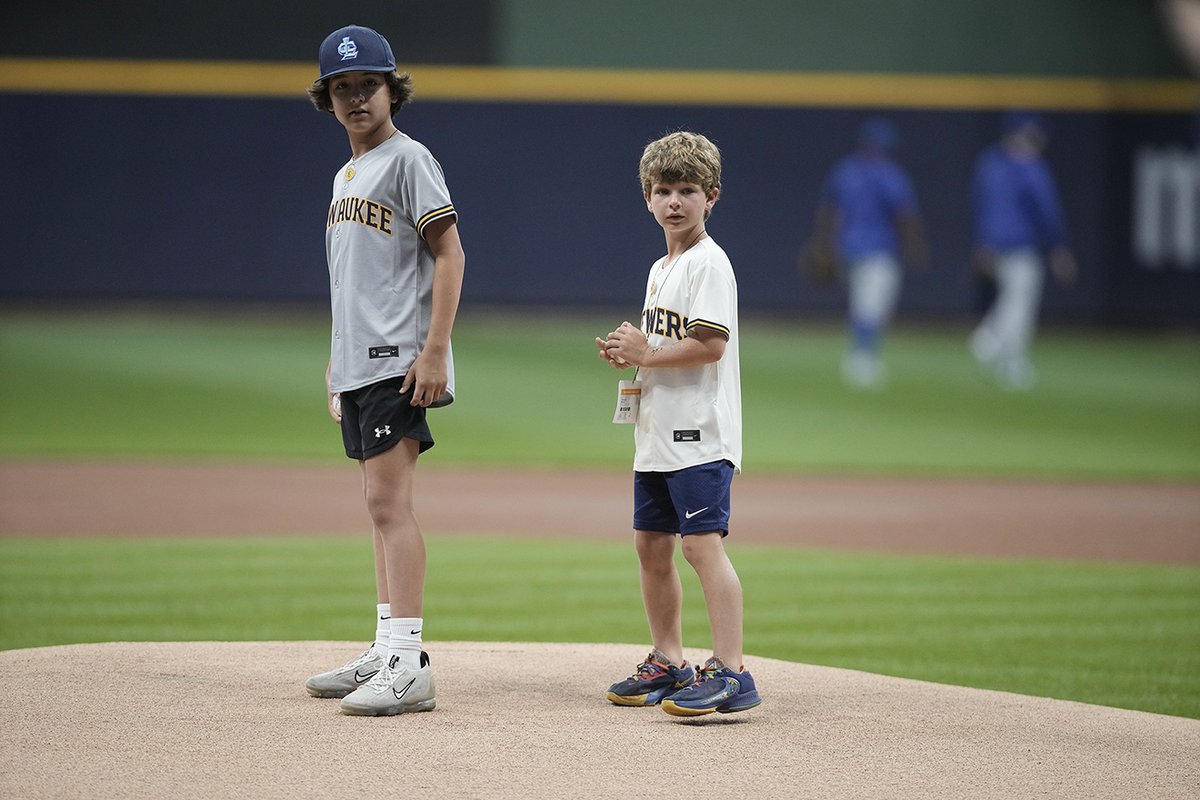 Brewers's tweet photo. Remembering a great. 

Sal Bando's grandsons threw out tonight's first pitch in honor of the late Brewers alum and former General Manager.

#ThisIsMyCrew