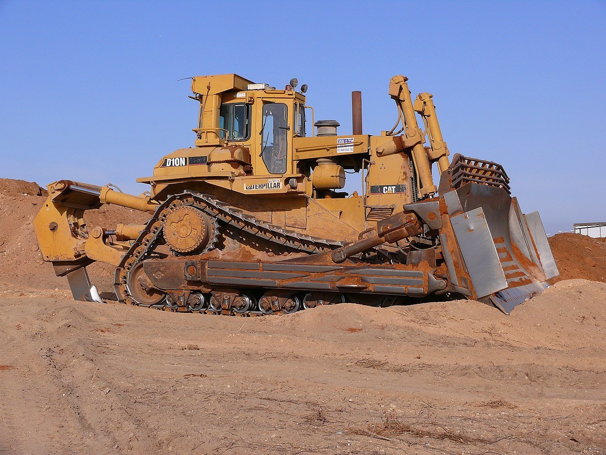 protosphinx's tweet photo. dear indian media

left: not a bulldozer
right: a bulldozer https://t.co/arGby61Byn