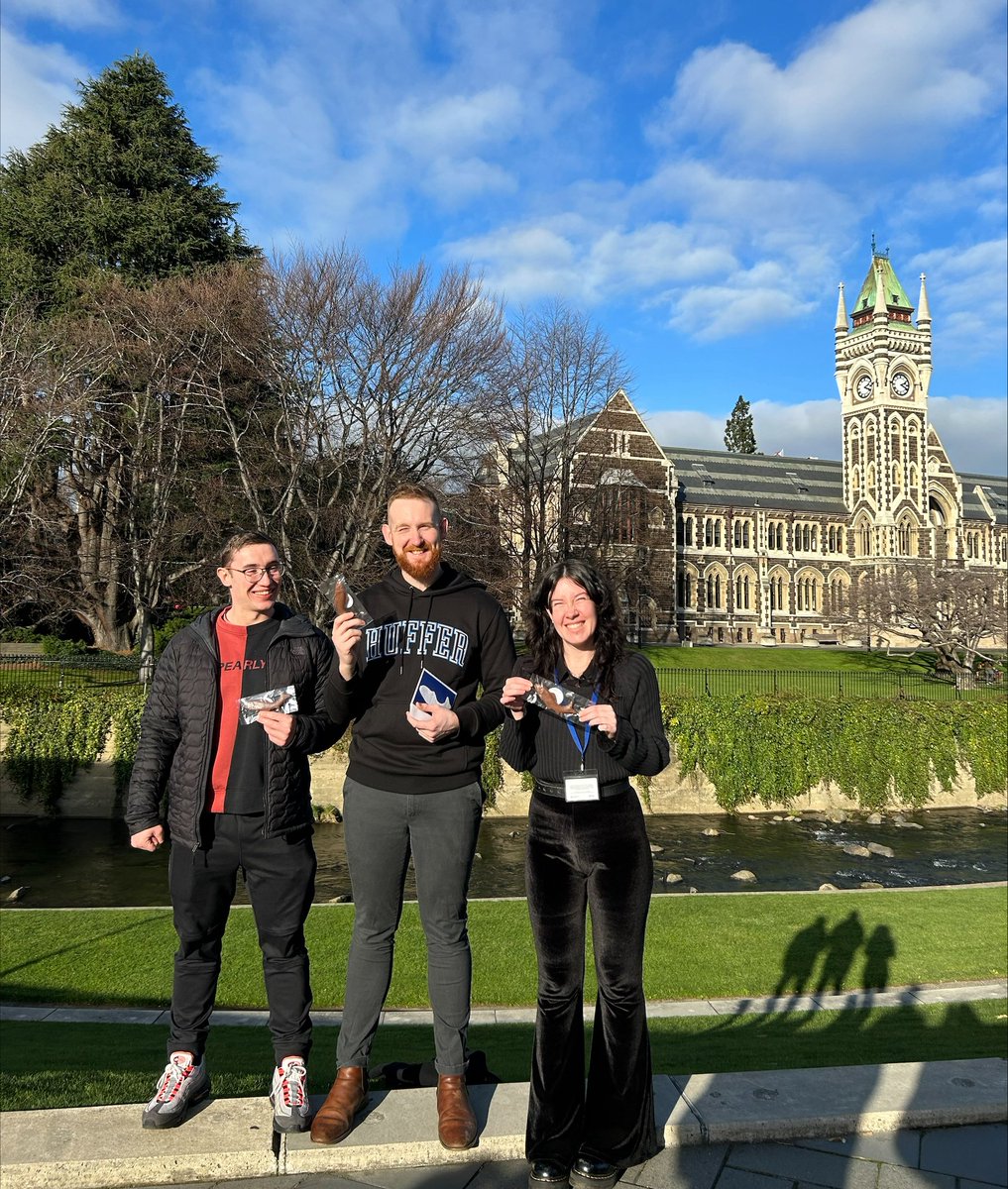 andreav_otago's tweet photo. Congratulations to @otago PhD candidates China Payne and Ian Liddle (pictured with the historic uni bell) who have handed in their PhDs for examination. Collection of chocolate fish also complete, along with Kaleb from the Larsen lab who also handed in. Well done everyone! https://t.co/sxM125Nnnb