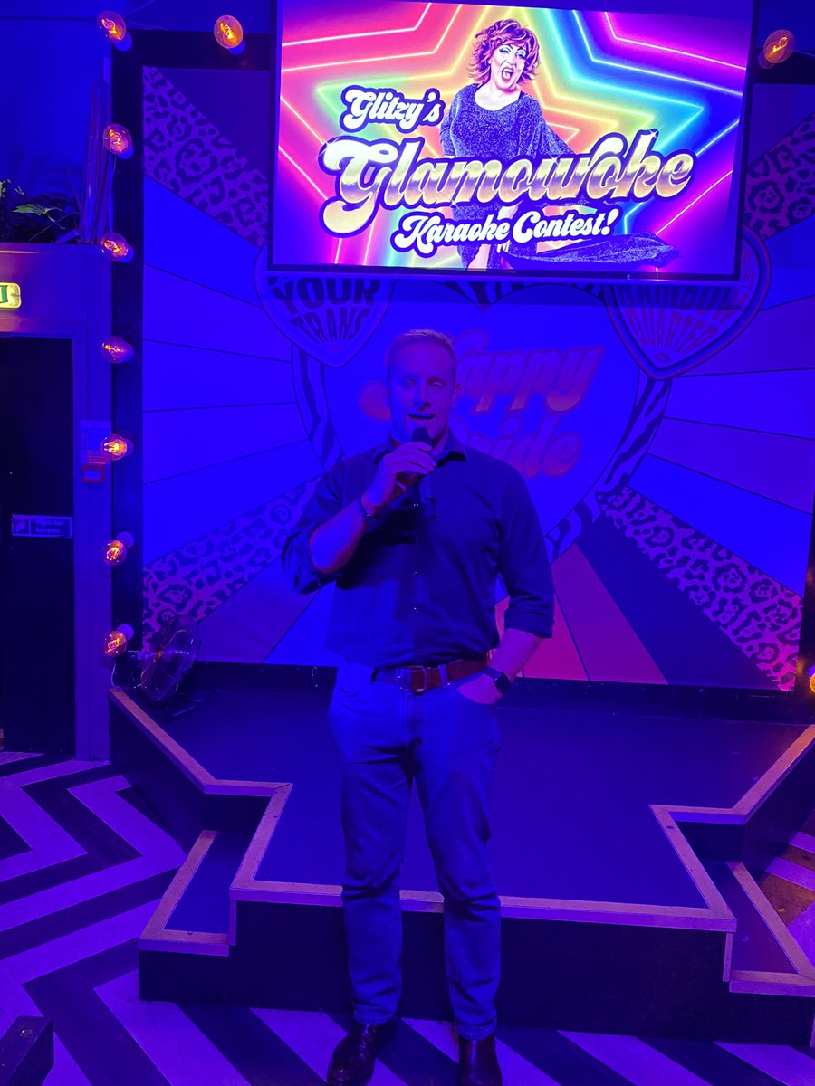 neilbuddel's tweet photo. Queeraraoke with my @amosshe_uk blokes with this guardian lion (had no lipstick to contribute; also a germaphobe) #amosshe2023 https://t.co/IsjGYKEXDv
