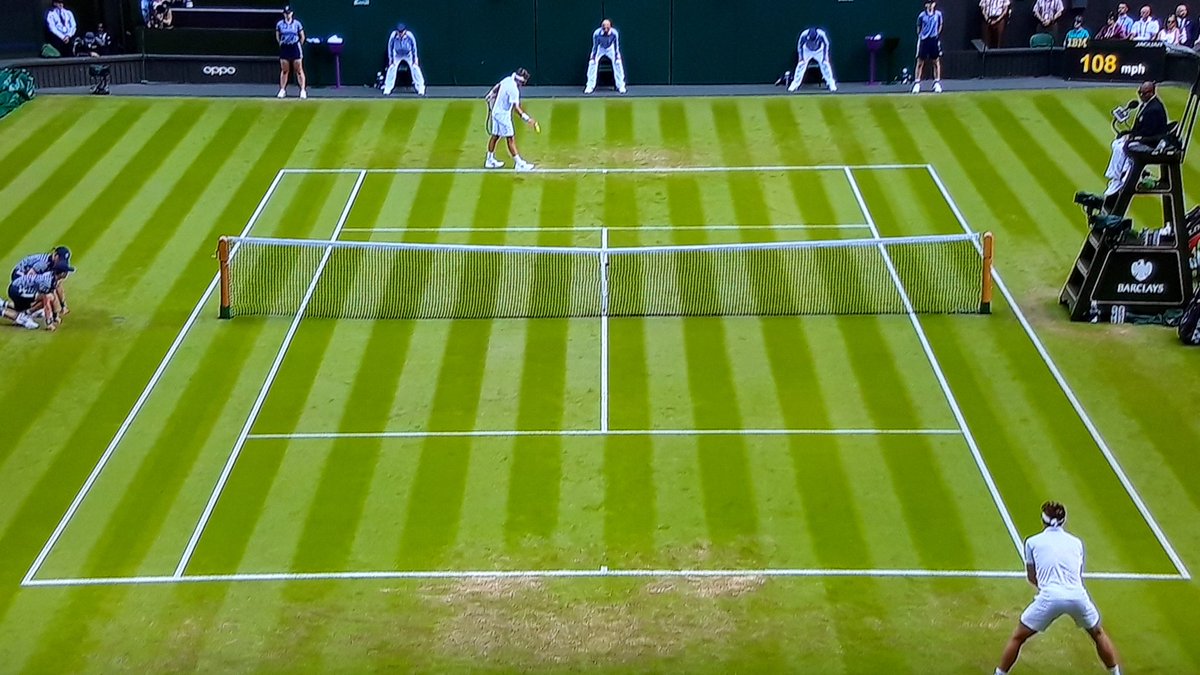 PurpulanOne's tweet photo. Nice game in the mirror on Centre Court: @CasperRuud98 Vs @Liambroady... Who's who at @Wimbledon?! https://t.co/zq3jTo7M11