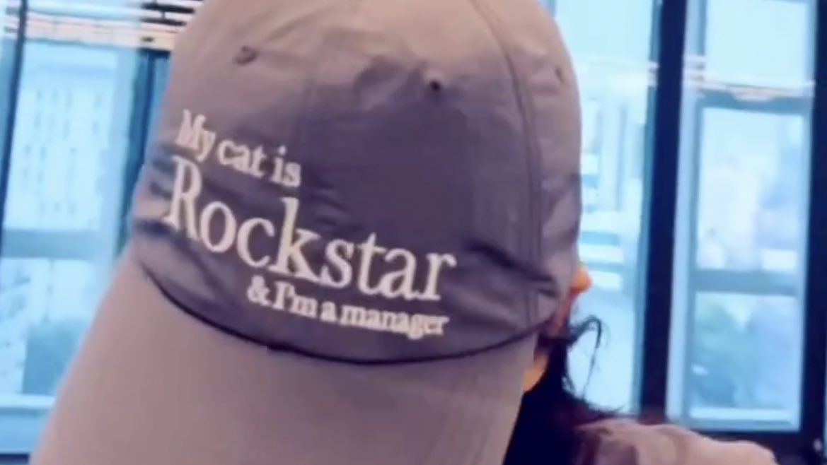 tyongsource's tweet photo. taeyong and seulgi wearing my cat is rockstar &amp; i’m a manager merch😭😭 https://t.co/vvjRhzuY5B