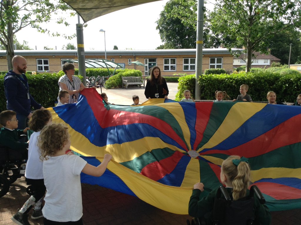 The Sunflowers, Owls and Gruffalo's had great fun playing parachute games.