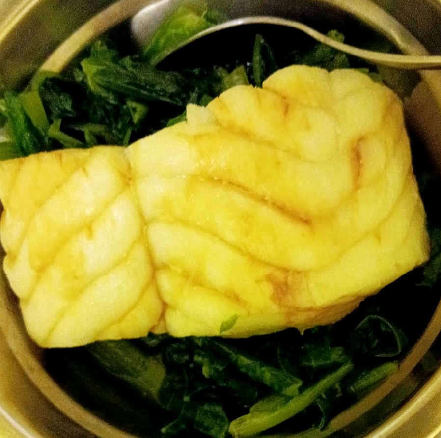 Bao Bao is cooking a boneless Ling fillet for Baby with lots of bamboo leaves