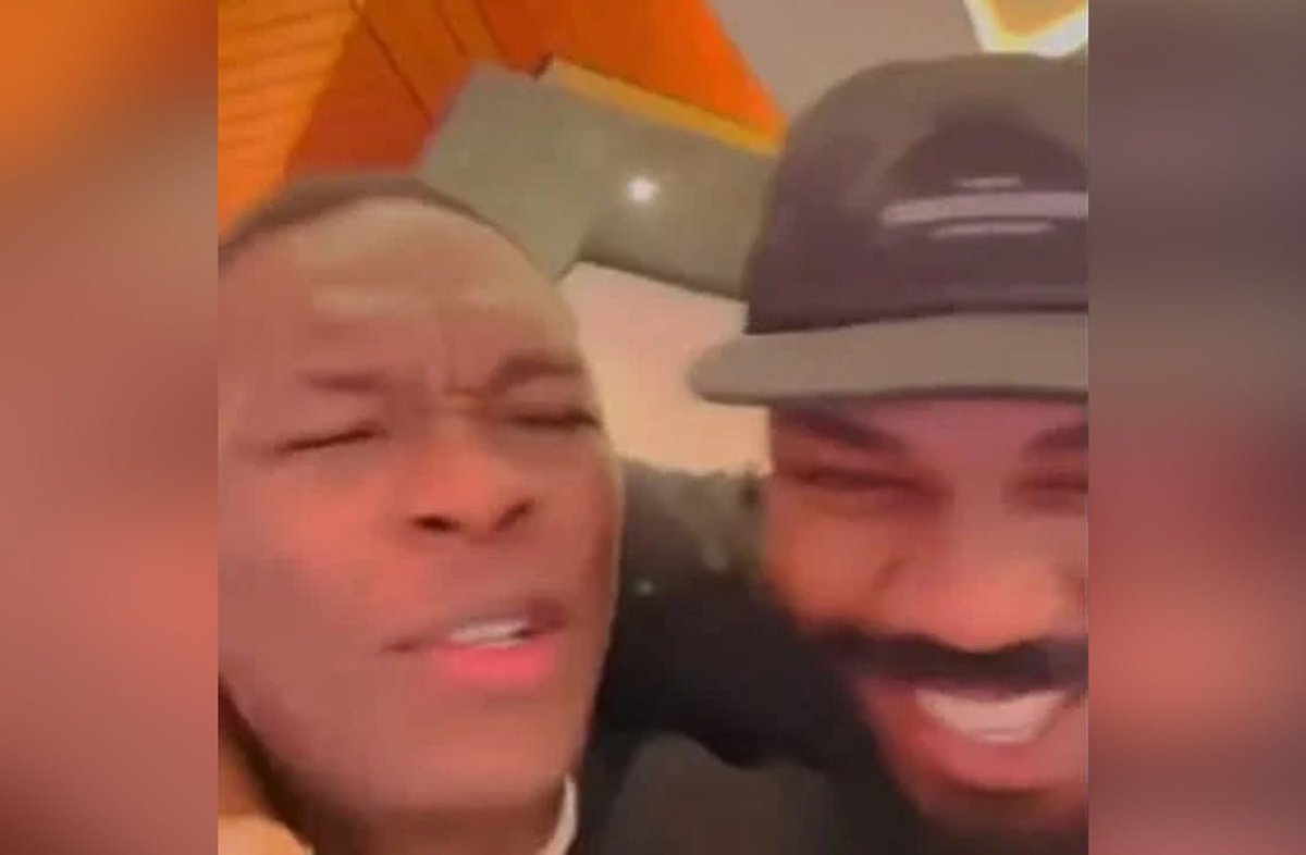 mmamania's tweet photo. Video: Israel Adesanya and Jon Jones pal around after years of feuding online https://t.co/E6RixAtrrt https://t.co/fxlPWCq7A9