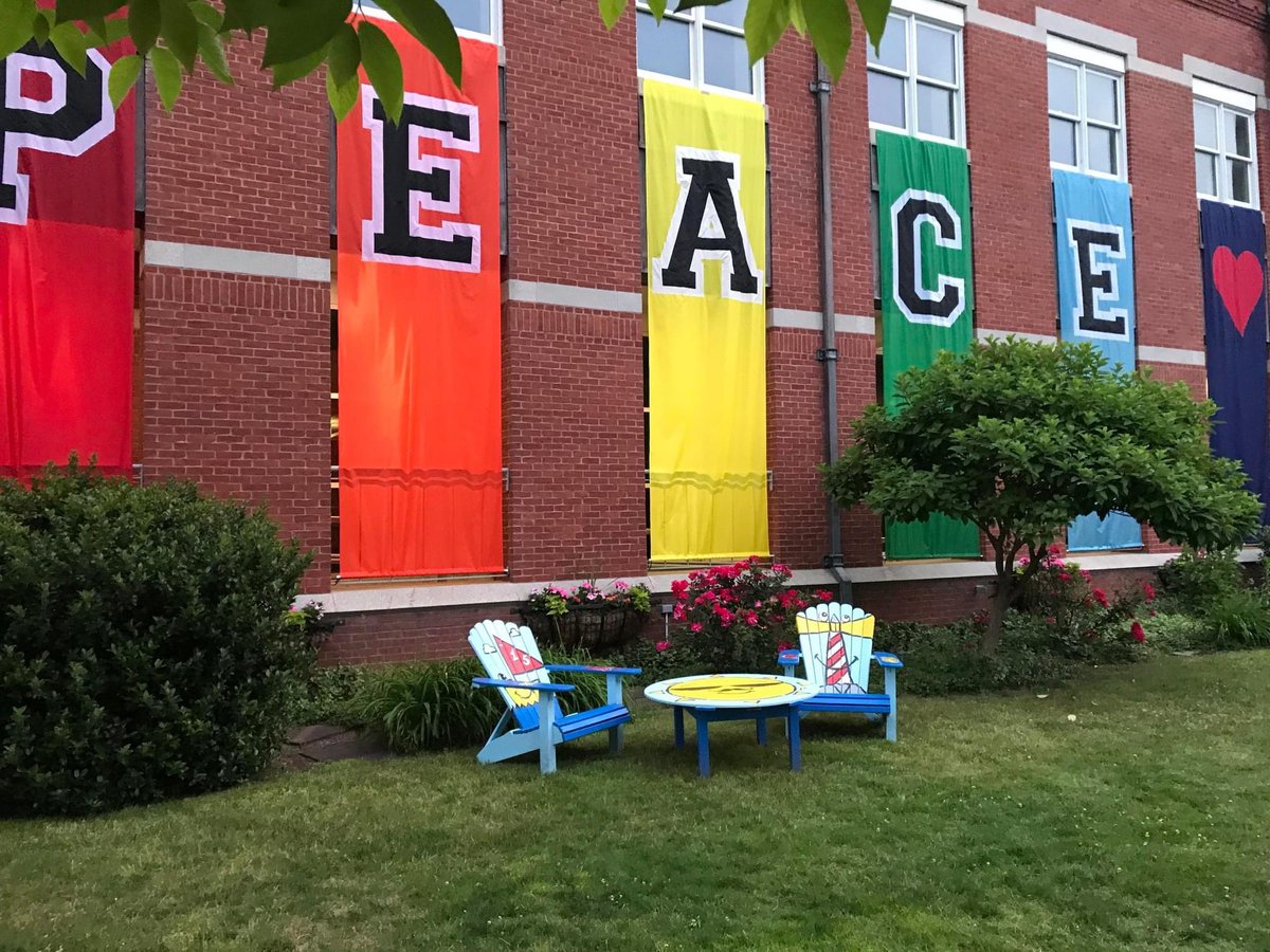 The Adirondack Chairs I painted in Natick, MA a couple of months ago. I love the rainbow peace sign behind them! Thank you for the photo, Kathryn Doran. @natickcenter