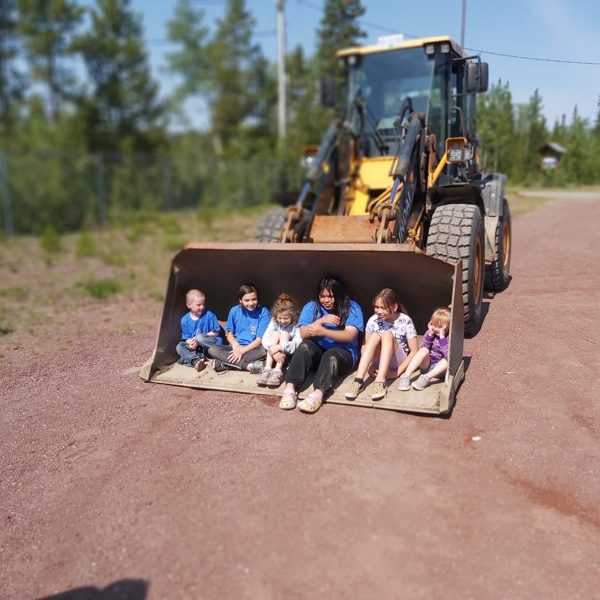 EmconQuesnel's tweet photo. Quesnel BC, Future machine operators, Nazko School. Kids had a great time sitting in the truck and loader seeing how they work. The air horn got a major workout and the loader will need a grease job on the front end. #SA18 #roadcrew #essentialservices4u https://t.co/pH3sVl4xI1