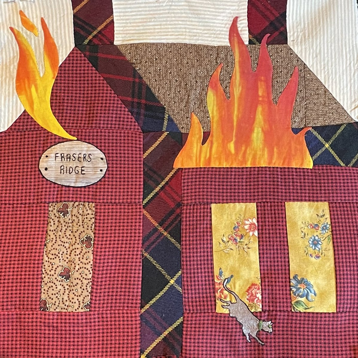 Detail of my Fraser’s Ridge Patchwork Block. This block is featured on my Outlander Story Patchwork Costume.That is Adso jumping out the window! #kylanderkouture #outlandercosplay #outlander #patchwork #handembroidery