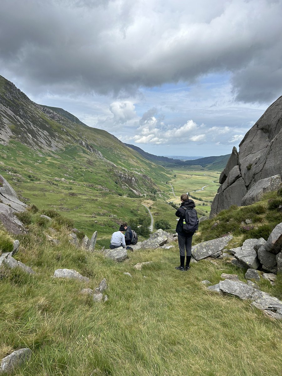 SPHSGeog's tweet photo. Day 2 has been a blast!  The wind has picked up, but the rain has stayed away (for now).  Great for observing the glacial landscapes of Cwm Idwal and Nant Ffrancon @StPetersRCHigh https://t.co/2JKAiCznGl