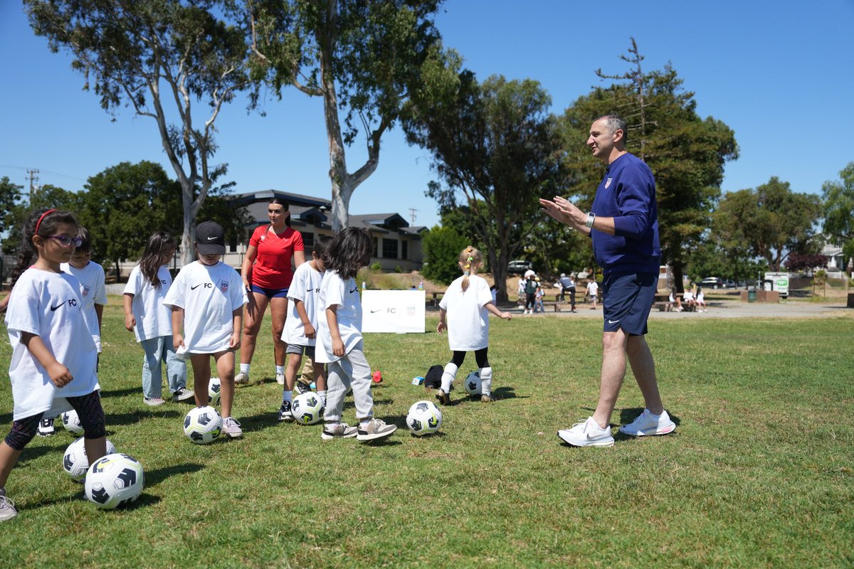 USWNT's tweet photo. Vlatko Andonovski and the #USWNT staff dropped in to surprise kids at a @nikefootball + @ussoccer camp today in the Bay Area, teaching skills to use on and off the field ⚽ 🇺🇸 https://t.co/2151UL47UT
