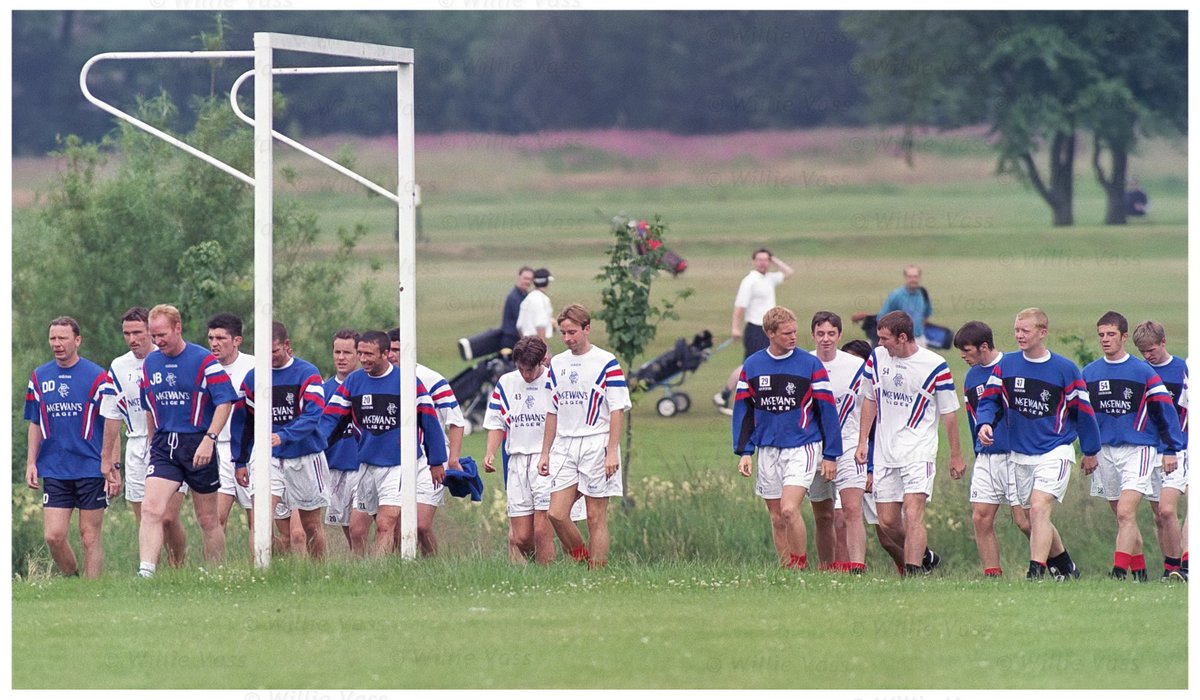 Golfers scratch their heads and look on as Rangers open pre season training in 1996 by doing laps around Haggs Castle near Bellahouston Park in the morning and then on to Anniesland College for the afternoon session.