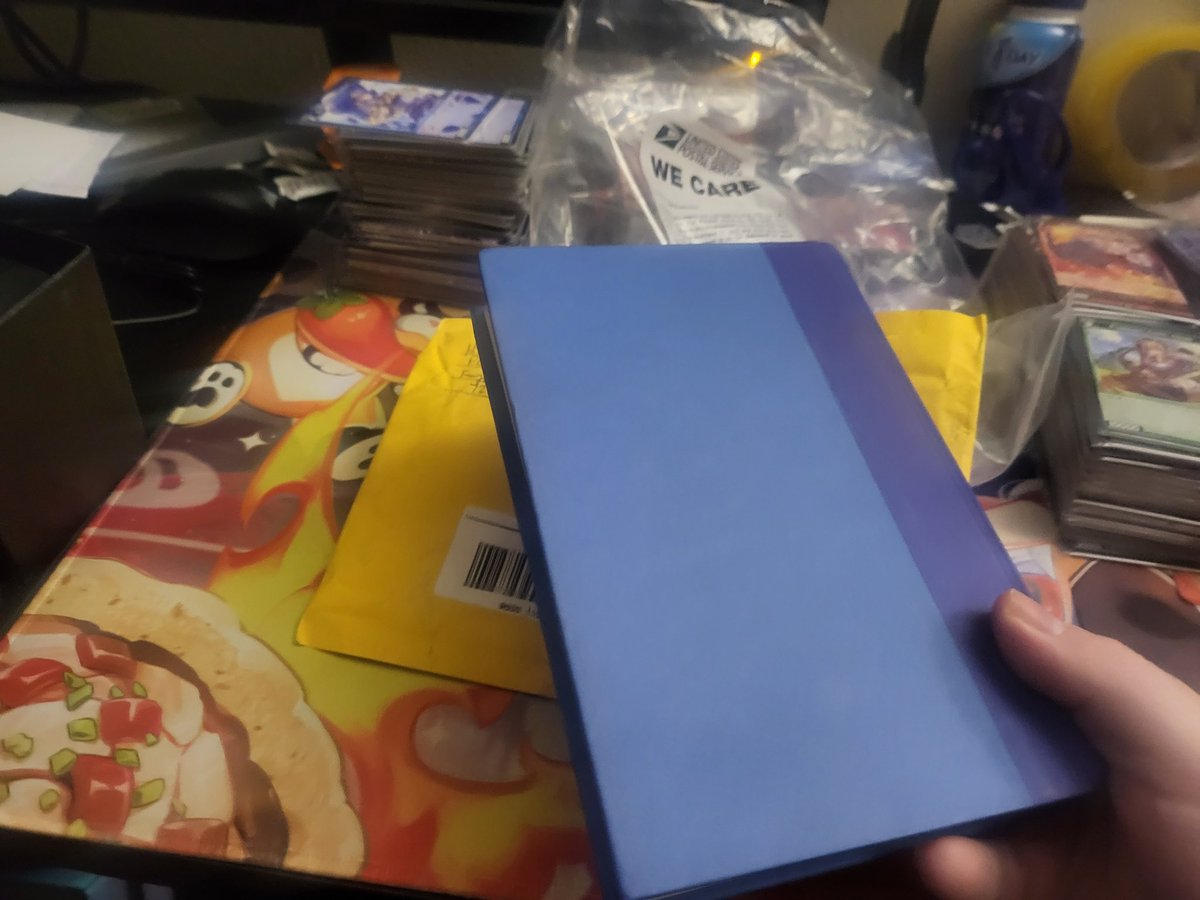 HellFyreKYami's tweet photo. Alright @USPS , how do you fk up this bad. Was supposed to be packs of cards for a recent online event but instead got a package that looked deliberately opened and replaced with a book. You can't even fit the book back in the created hole so obviously that's not what belonged https://t.co/ZHOokfLH9a