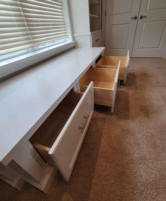 Cabinets are a versatile storage solution that can be utilized in any area of your house. This showcases open shelving yet these cabinets effectively conceal and organize various belongings that require storage. This design was done by Wood-n-Dreams in Scotch Plains NJ.
