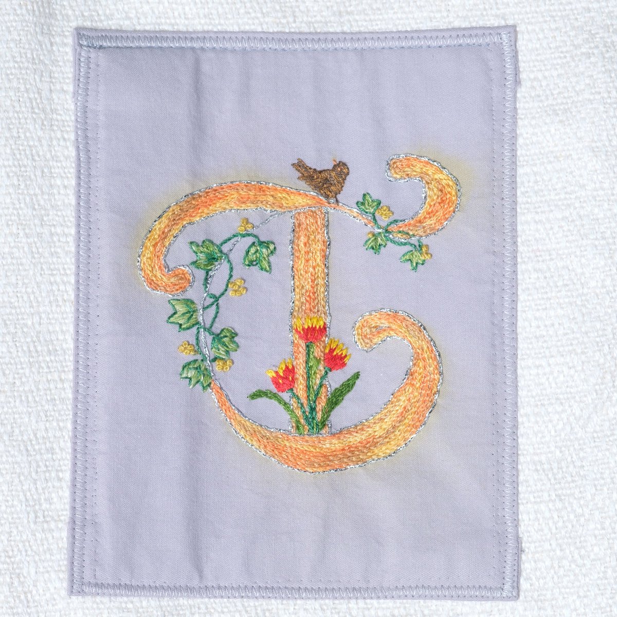 Inverkeithing Stitching in Time – 79th of 82 embroidery pieces. The artwork showcases images from Inverkeithing’s history. Like the artwork, we will showcase images of the amazing stitching talent, in chronological order

T - by Lucy Van Der Ven