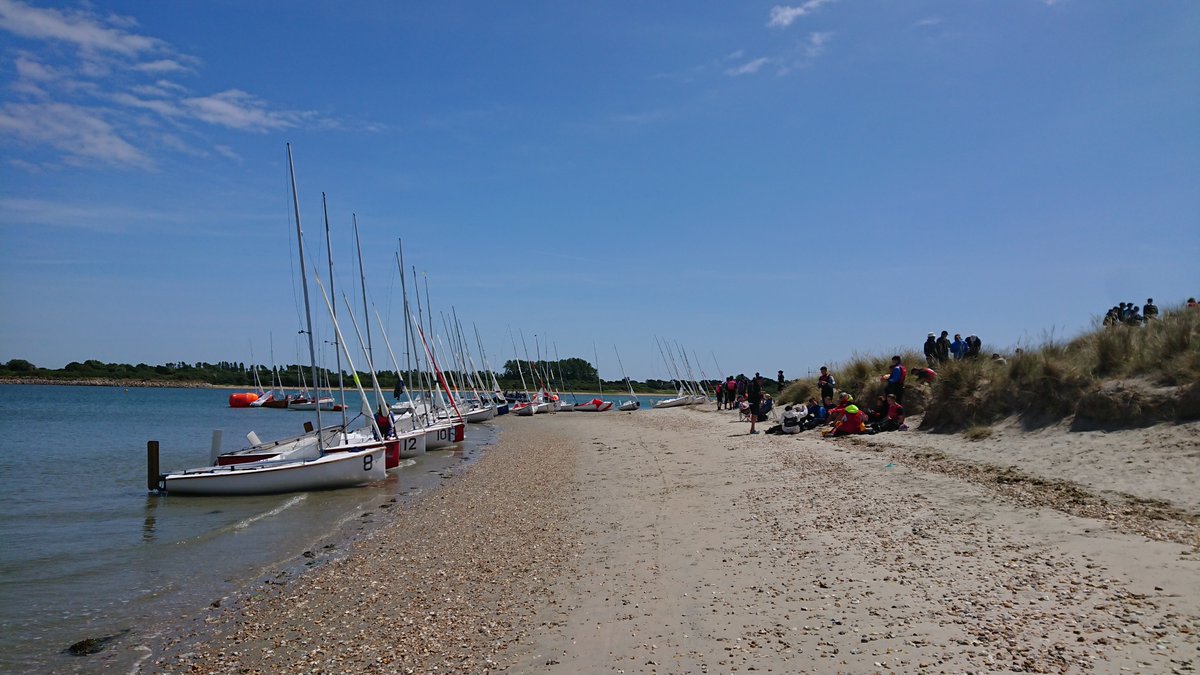 RadleySailing's tweet photo. Perfect sailing weather at Itchenor for Race Day #1, with a lovely lunch break at East Head Beach. The competition is tough, but again, lots of useful lessons learned and both crews are improving. @RadleySports⛵ ⛵ ⛵ https://t.co/vCq9ziav7F
