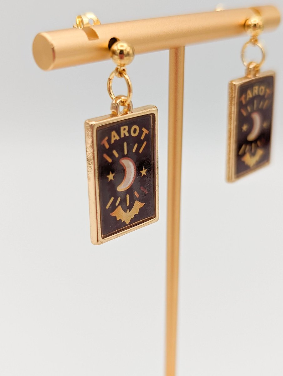 HappyTikis's tweet photo. Excited to share the latest addition to my #etsy shop: Tarot Card Black and Gold Dangle Earrings, Halloween Jewelry, Fortune Teller Earrings, Occult and Divination Jewelry, Paranormal Earrings https://t.co/unKeBJVhdQ #girls #earlobe #gothic #pushback #gold #no #black https://t.co/T6U6WHGU21