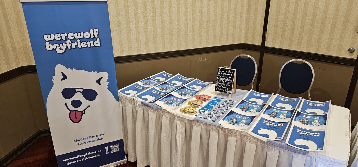 werewolfbfmusic's tweet photo. We're all set up @fureh! Come snag a free sticker or a button at table E6 Right inside the door to the dealers den! 
Show is Saturday at 6 in the bar (Studio Fifty-Fur) 
Merch 4 Sale @ our table on Sunday!
#fureh #fe23 #fureh2023 #furcon https://t.co/mEotDWHXIV