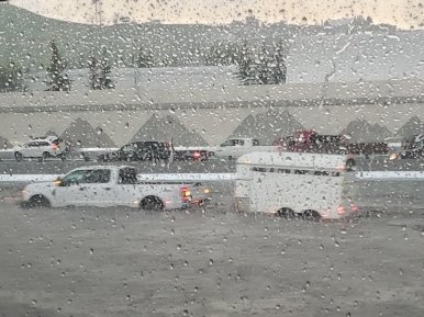 PrairieChasers's tweet photo. HWY1 near Canada Olympic Park Calgary, Alberta is under water #abstorm #yyc 📷: @AdamMofo https://t.co/21TaHmMkHV