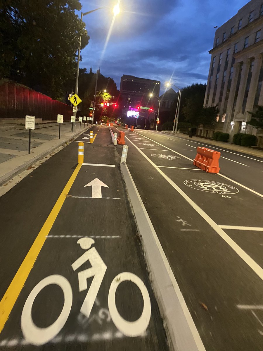 NickNorthen's tweet photo. Woo hooo! After a looong day at work, I get to ride home on these #protectedbikelanes outside the State Capitol for the first time 👏🏽 https://t.co/rrhzprmFm6