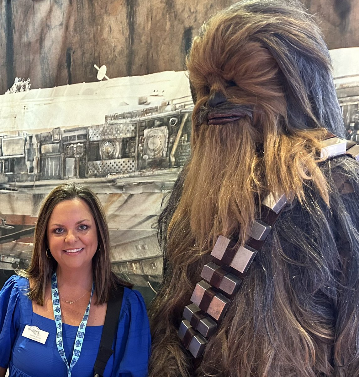 bridgesofok's tweet photo. We love talking about Bridges wherever we are! Last weekend Executive Director Stacy Barr Bruce spoke to @soonercon attendees and saw a familiar character! Thanks SoonerCon, for choosing us as your charity for this year’s convention! #bridgesnorman #normanok #thingstodoinoklahoma https://t.co/MByNMbGfMu